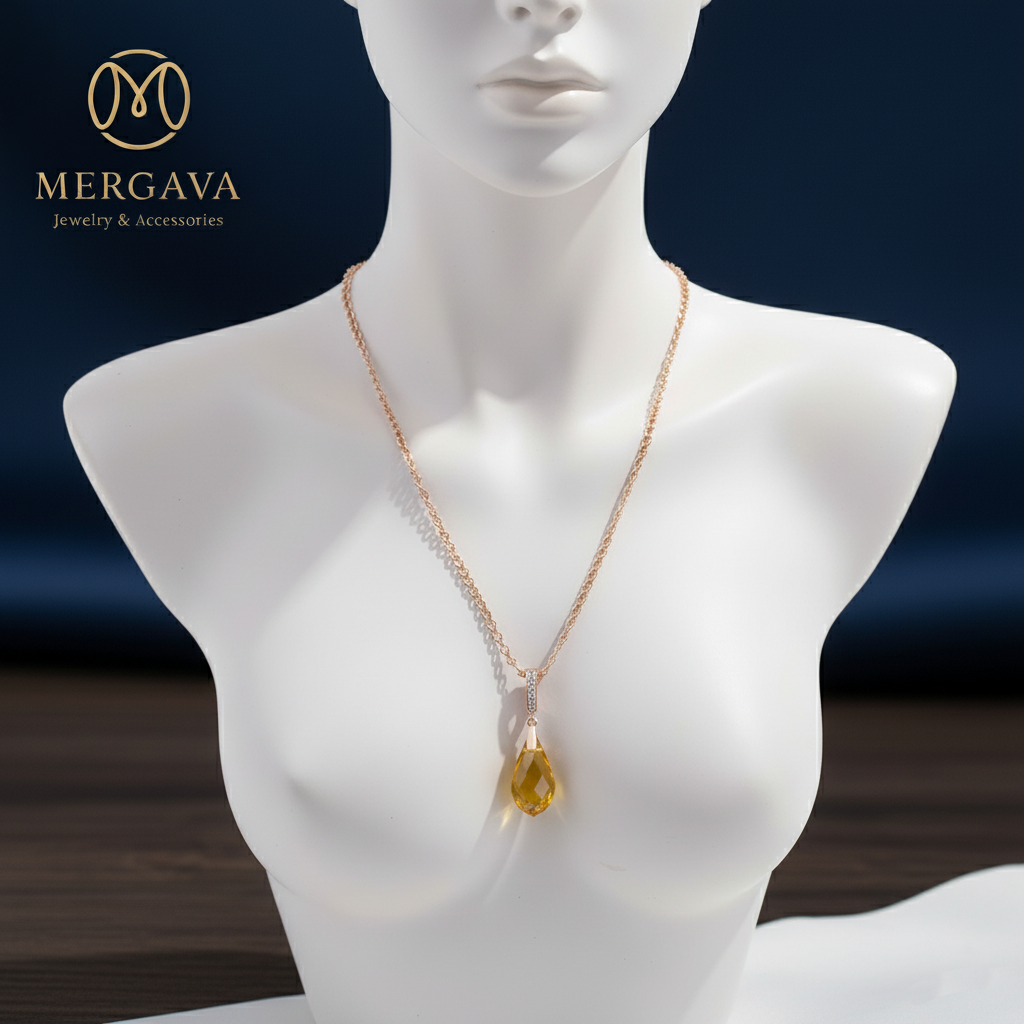  Mergava gold-colored chain necklace with a yellow drop-shaped pendant.