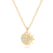 Gold necklace with sun and moon pendant on a white background