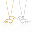 Gold and silver dachshund-shaped pendants