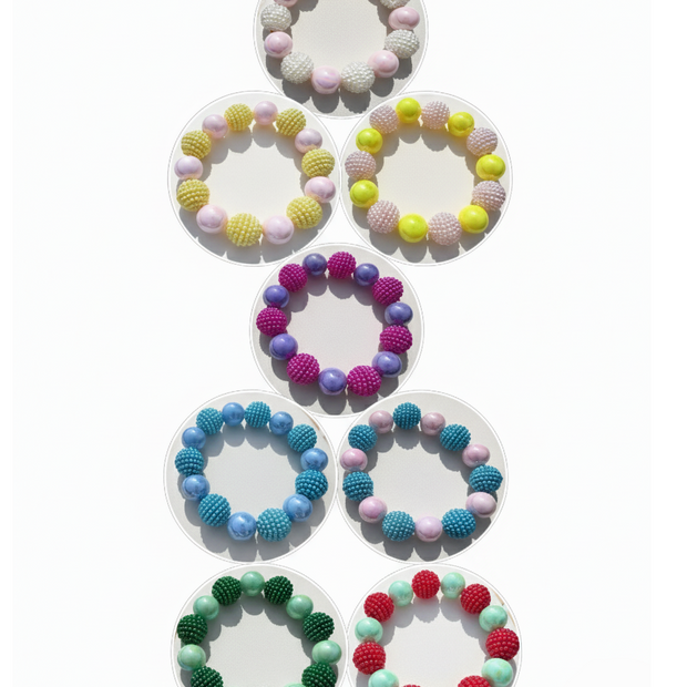 Set of colorful bracelets with bead designs on a white background
