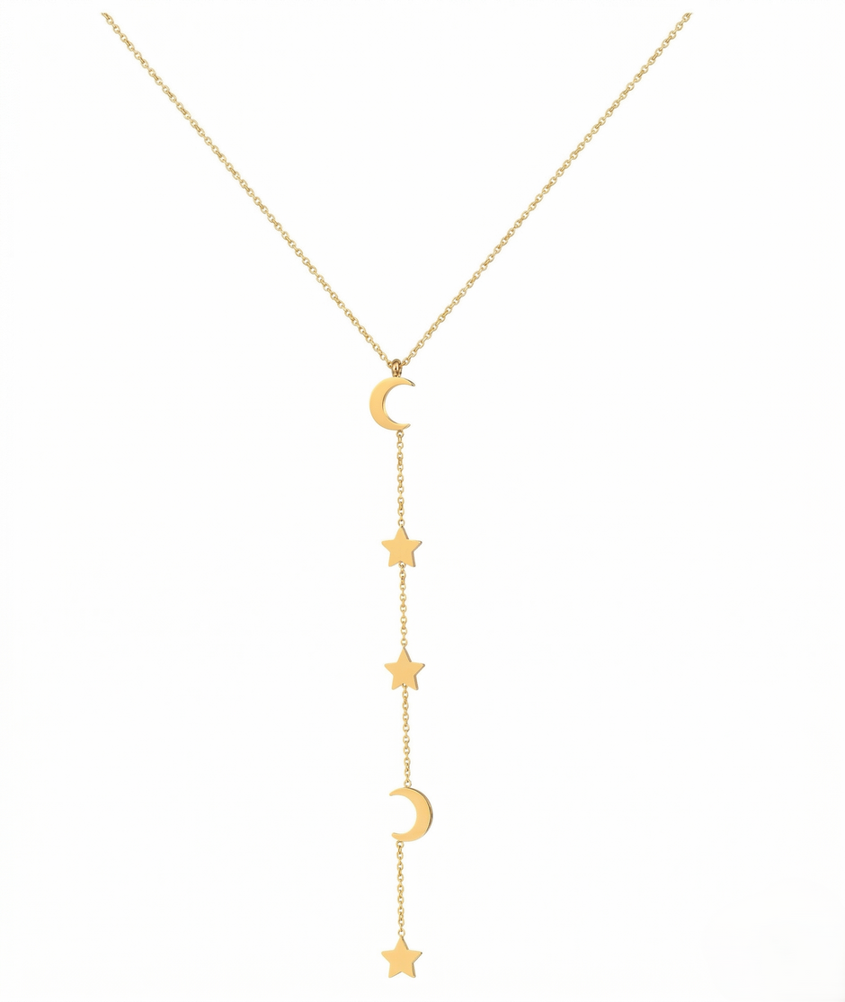 Gold necklace with star and moon pendants on a white background