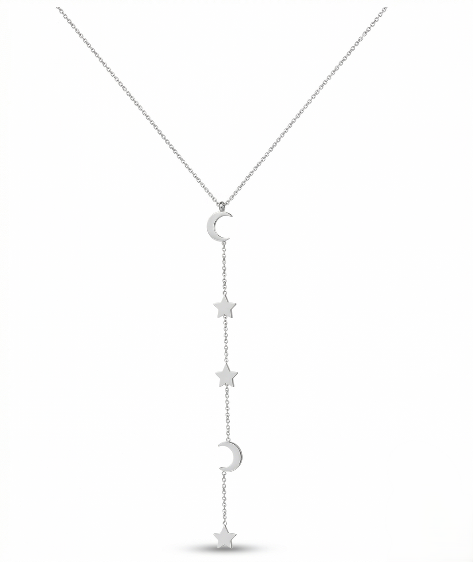 Silver necklace with star and moon pendants on a white background