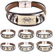Set of zodiac-themed leather bracelets on a white background