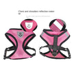 Pink dog harness with reflective material on a white background