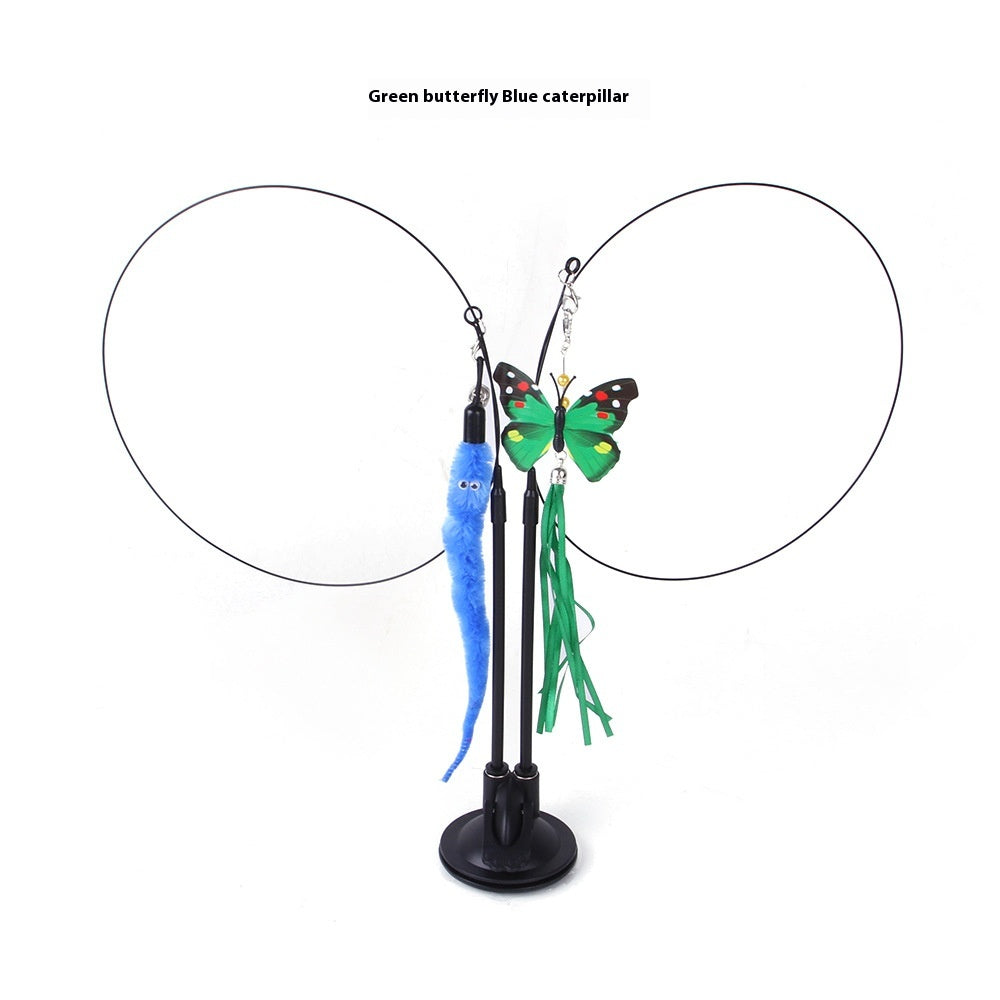 Butterfly and caterpillar toy on a stand with text 'Green butterfly Blue caterpillar' above.