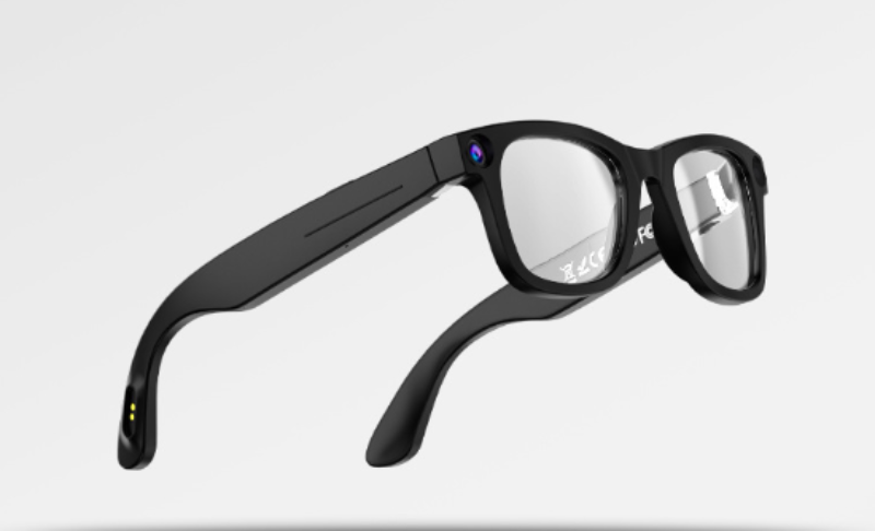 Black smart glasses on a light gray background