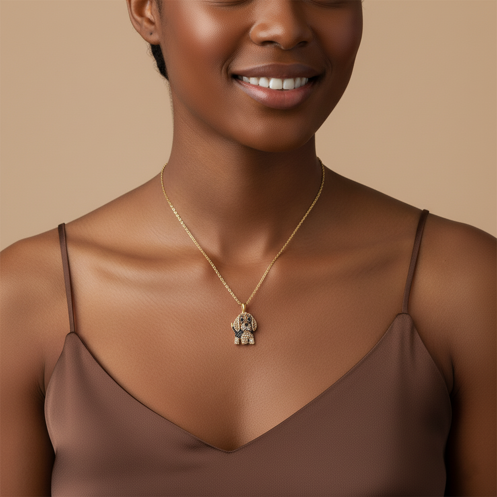 Woman wearing a gold necklace with a pendant against a beige background