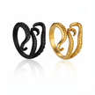 Black and gold octopus tentacle rings on a white background