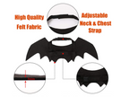 Black bat-shaped costume with adjustable neck and chest strap on a white background