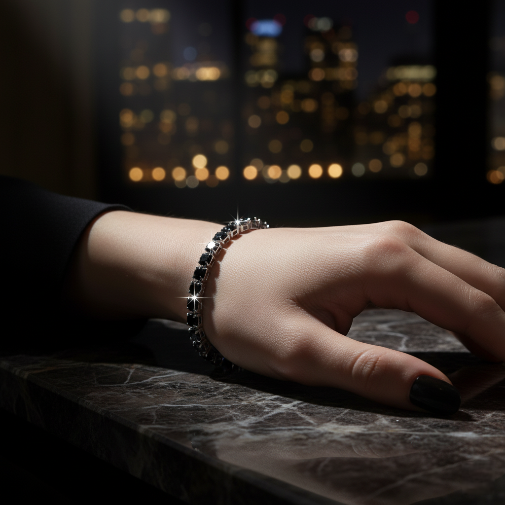 Hand wearing a bracelet with a cityscape in the background