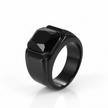 Black ring with a prominent central stone on a white background