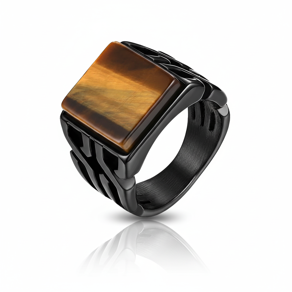 Black ring with a square brown stone on a white background