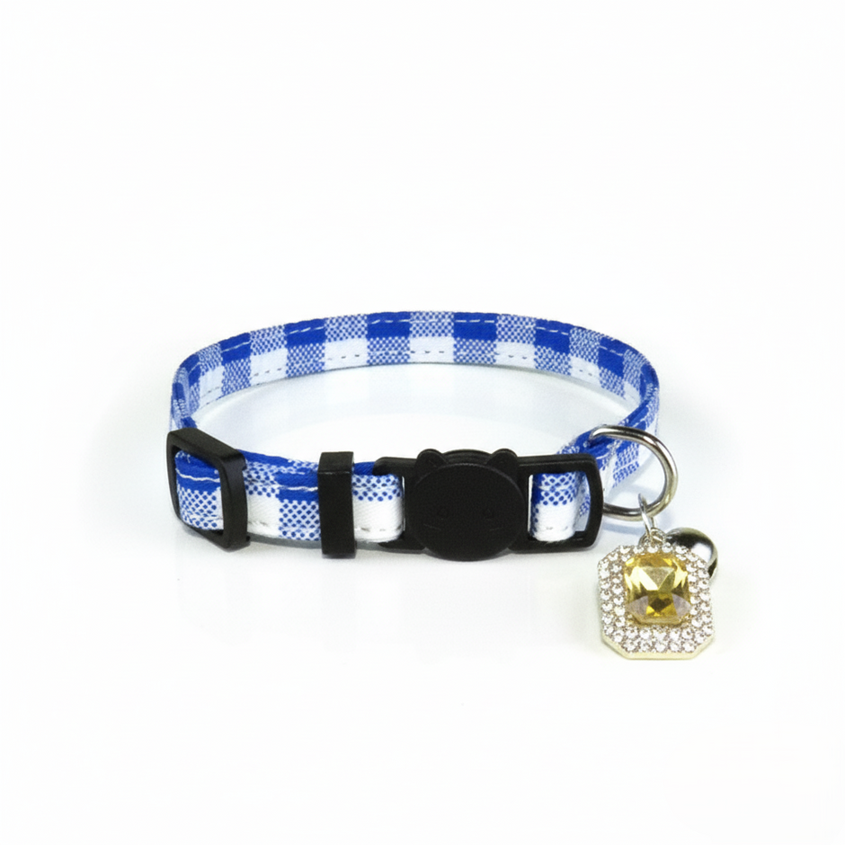 Blue and white checkered cat collar with a decorative tag on a white background