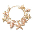 Bracelet with starfish and shell charms on a white background