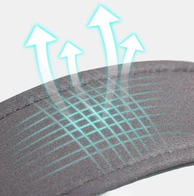 Close-up of a shoe insole with grid pattern and arrows indicating airflow.