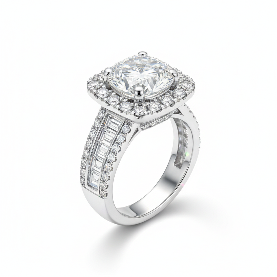 Diamond ring with a central gemstone and halo on a white background