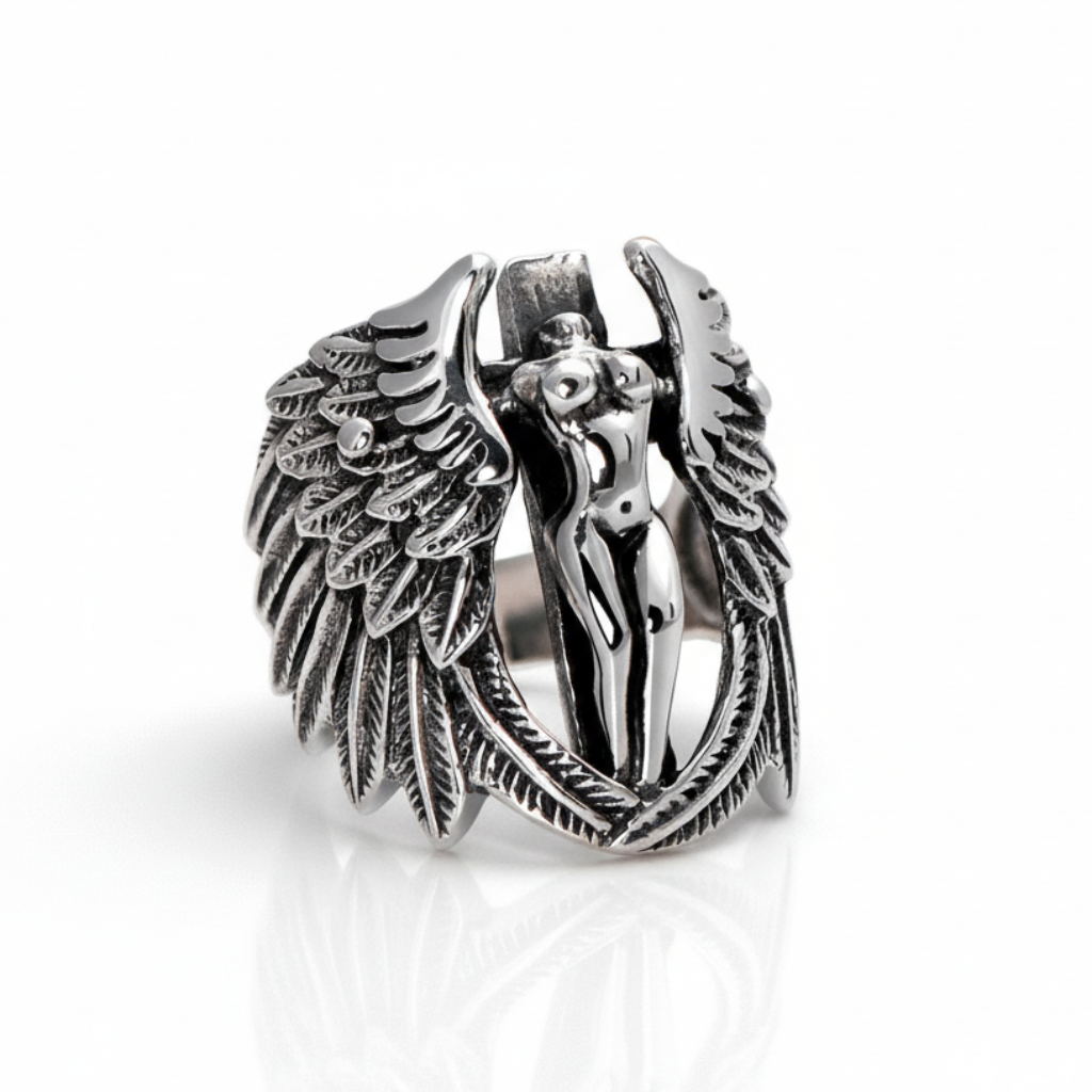 Silver ring with angel design on a white background