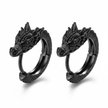 Black dragon-shaped hoop earrings on a white background