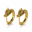Gold dragon hoop earrings on a white background