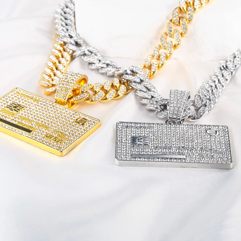 Gold and silver chains with rectangular pendants on a white background