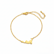 Gold bracelet with a cat-shaped pendant on a white background