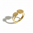 Gold bangle with two oval links on a white background