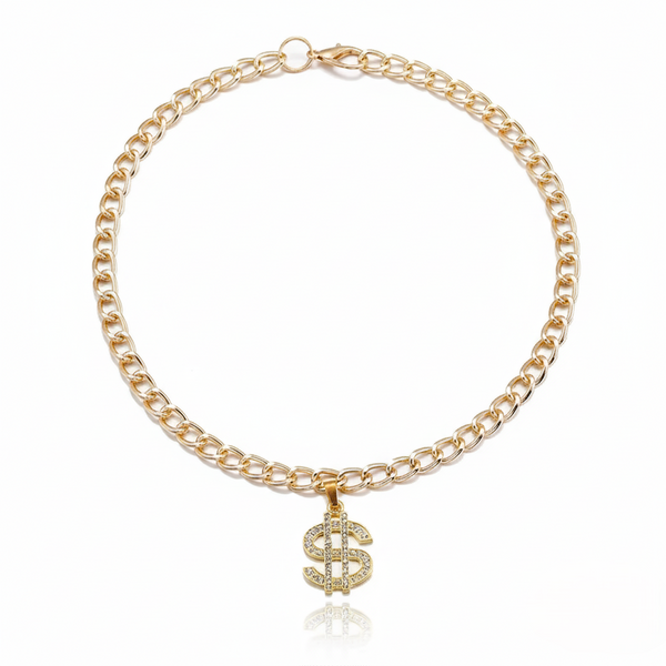 Gold chain necklace with a dollar sign pendant on a white background