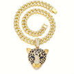 Gold chain necklace with a leopard head pendant on a white background