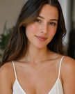 Gold finish interlocking hearts pendant necklace. Two hearts intertwined in titanium steel. Perfect symbol of eternal love and connection.