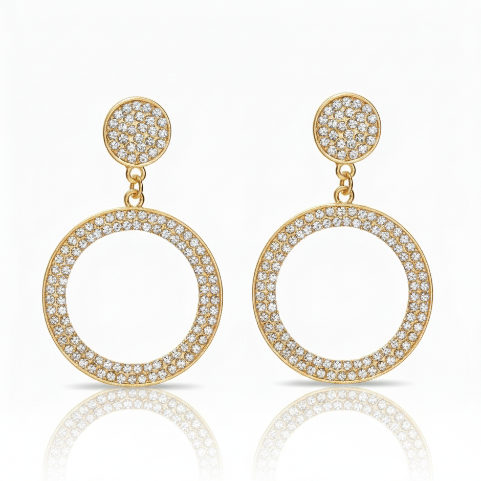 Gold hoop earrings with diamond accents on a white background
