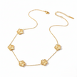 Gold necklace with floral pendants on a white background