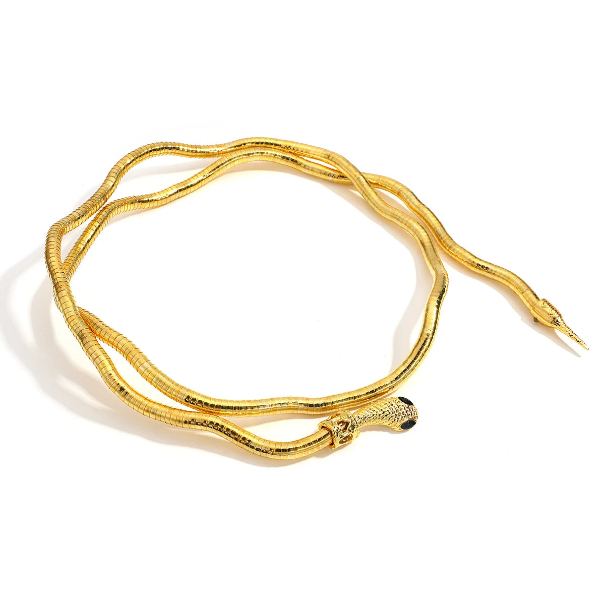 Gold snake-shaped bracelet on a white background