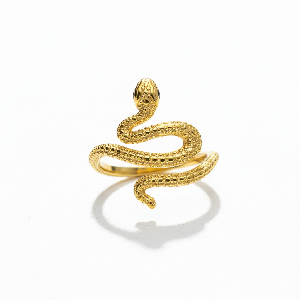 Gold snake-shaped ring on a white background