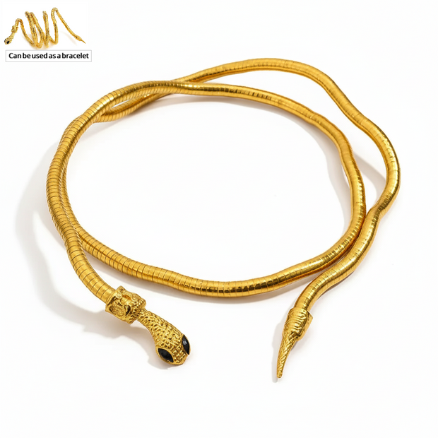 Gold snake-shaped bracelet on a white background