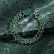 Green diamond bracelet on a green marble surface