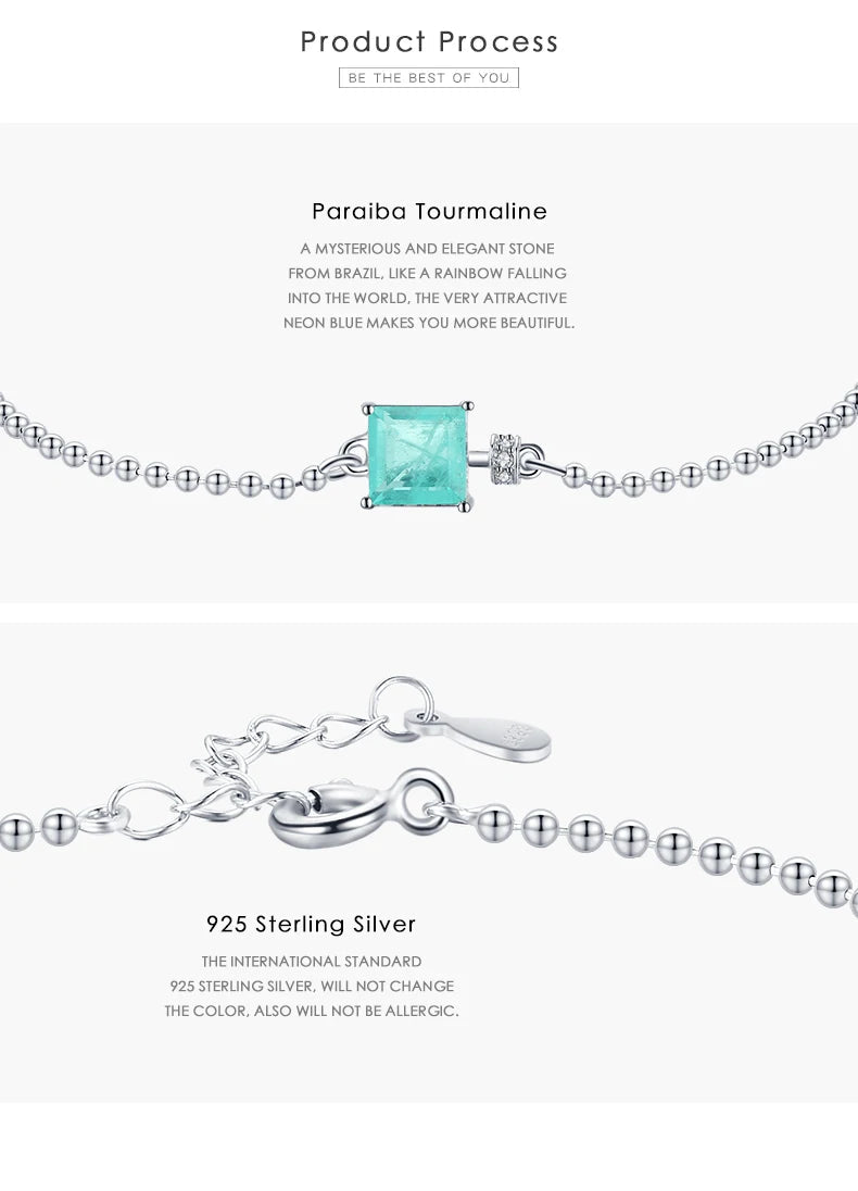 Jewelry with Paraiba Tourmaline gemstone on a white background