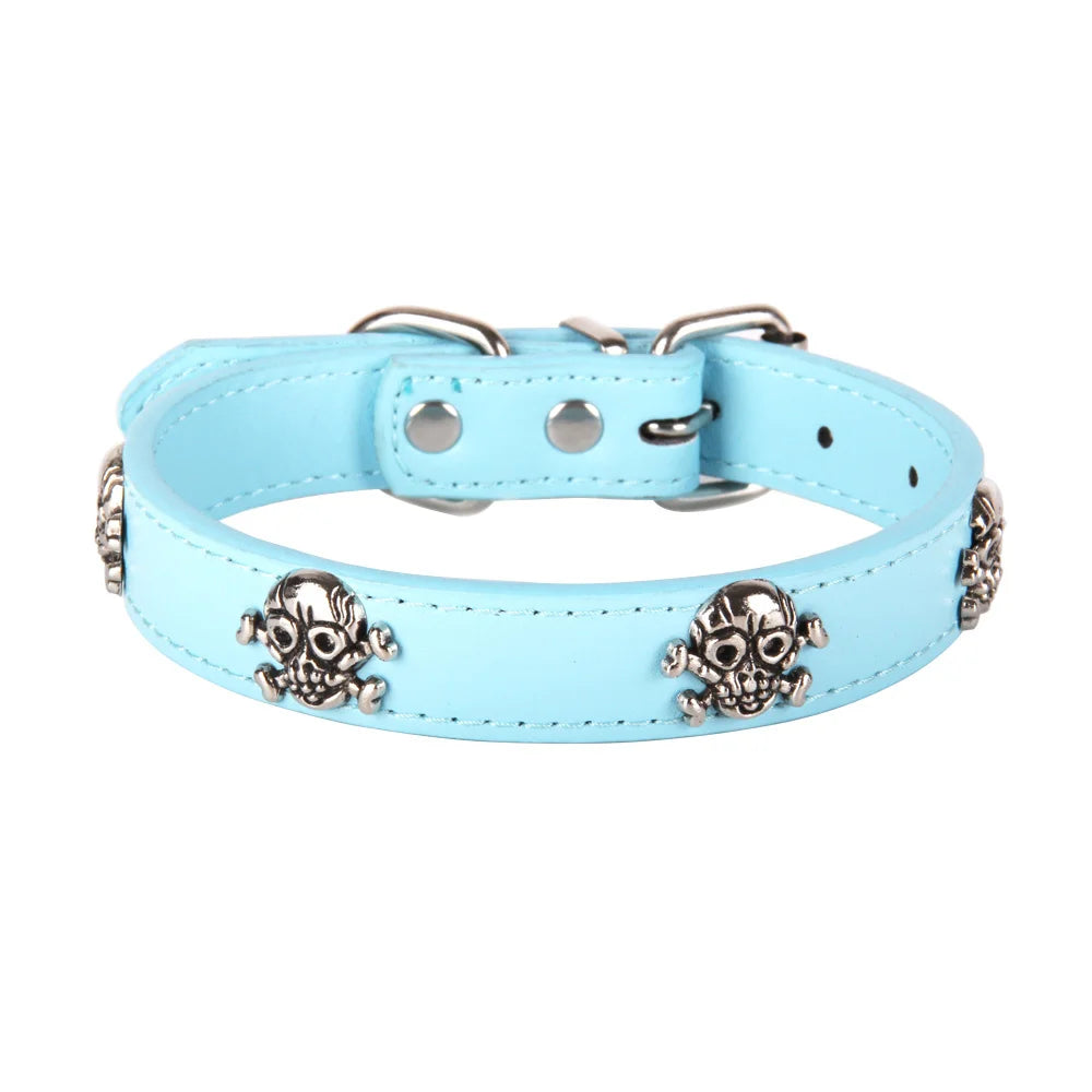 Light blue dog collar with skull designs on a white background
