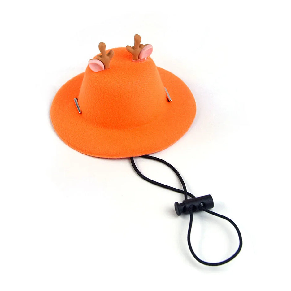 Orange pet hat with deer antlers and pink ears on a white background