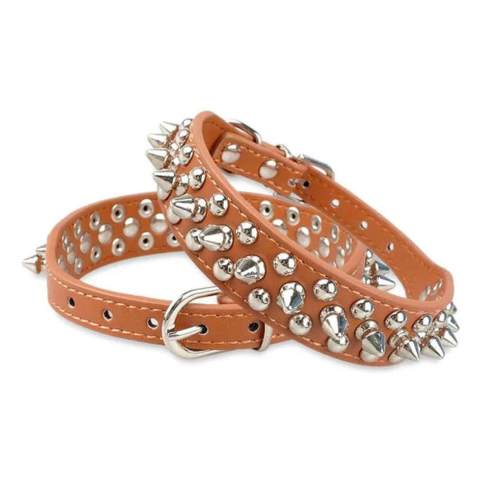Tan leather dog collar with silver spikes on a white background