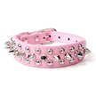 Pink dog collar with silver spikes and studs on a white background