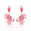 Pair of pink crab-shaped earrings on a white background