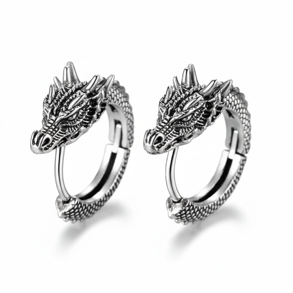 Pair of silver dragon hoop earrings on a white background