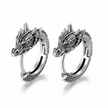 Pair of silver dragon hoop earrings on a white background