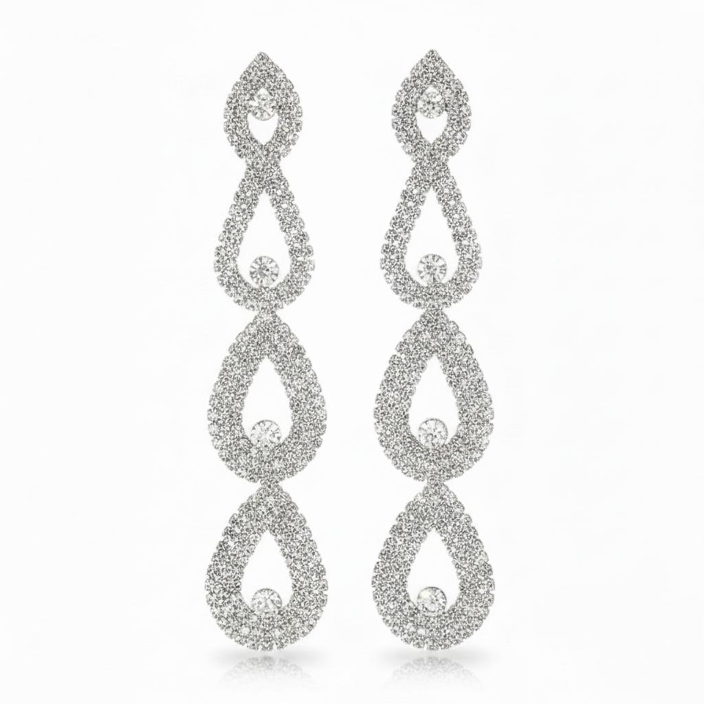 Pair of silver teardrop earrings on a white background