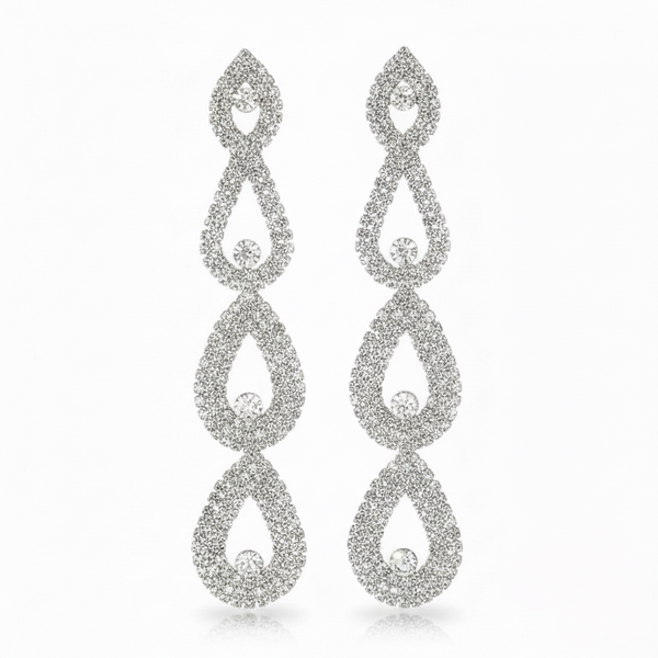 Pair of silver teardrop earrings on a white background