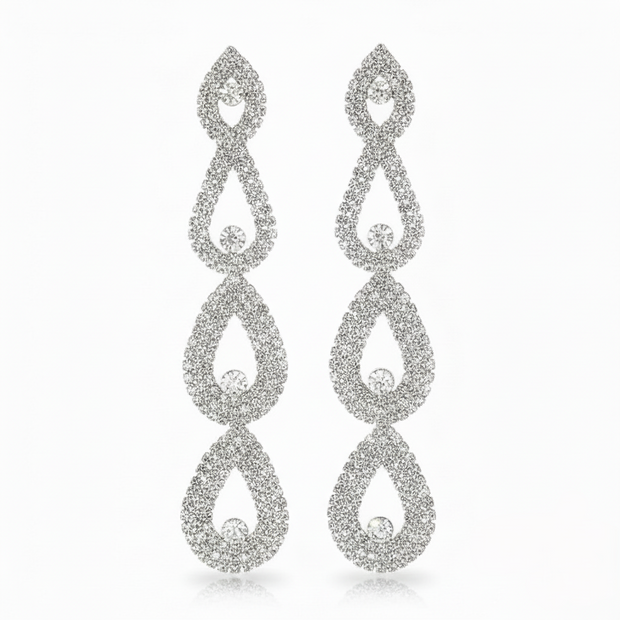 Pair of silver teardrop earrings on a white background