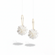 Pair of white floral earrings with gold hooks on a white background