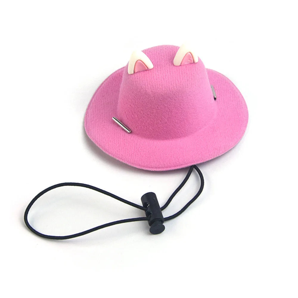 Pink cowboy pet hat with a black lanyard on a white background
