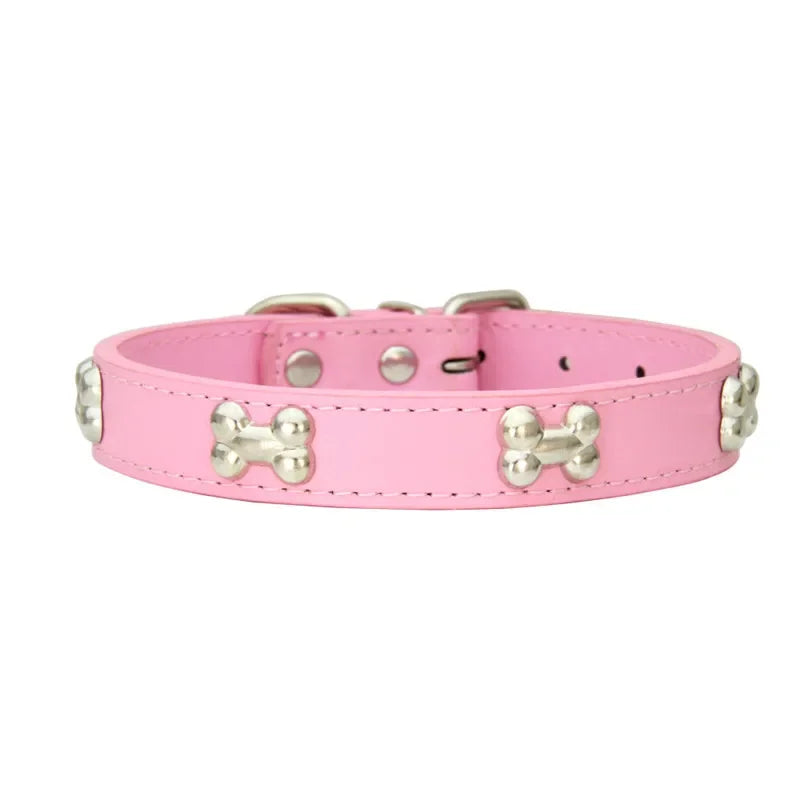 Pink dog collar with bone-shaped studs on a white background
