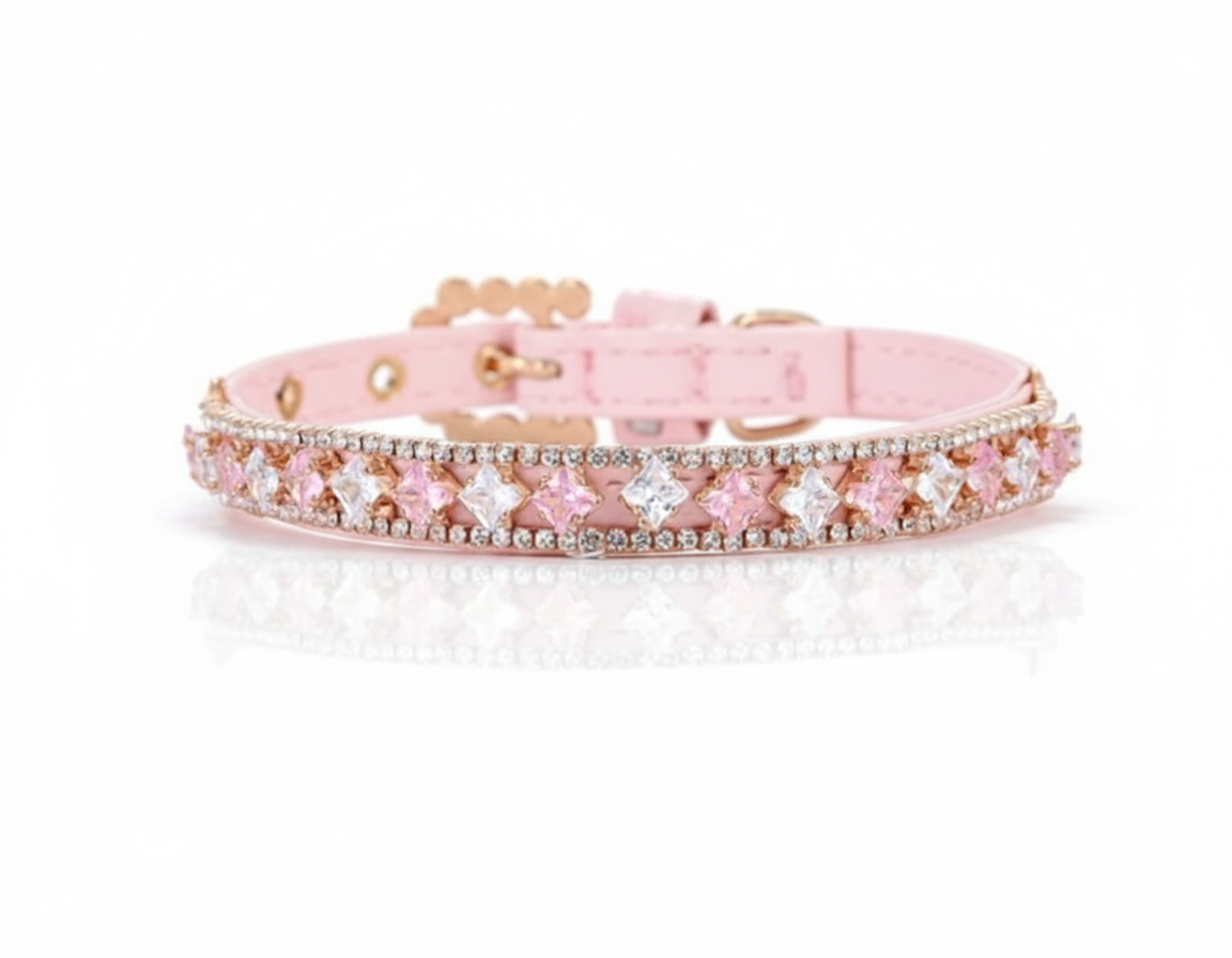 Pink dog collar with decorative elements on a white background
